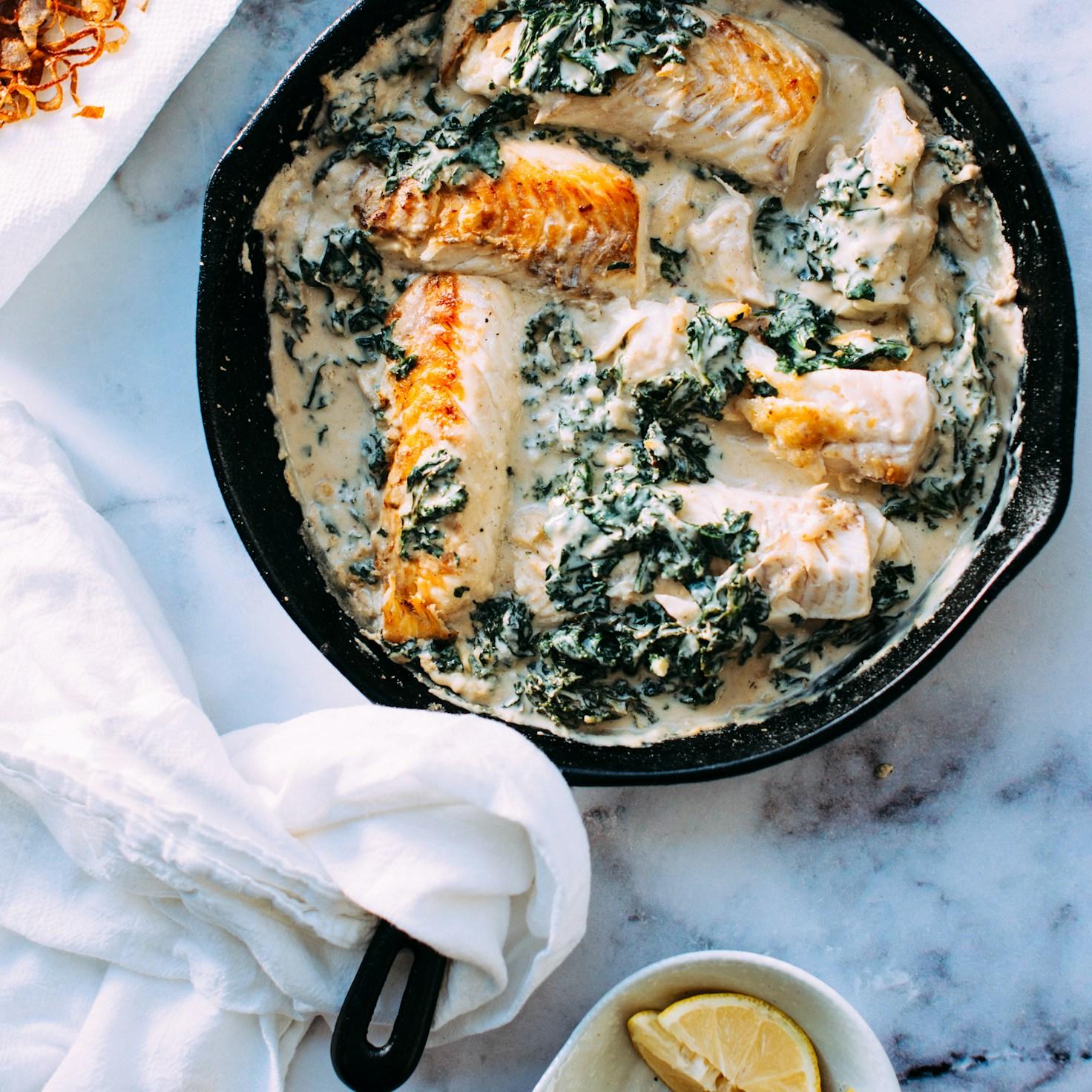 Members cooking together in a modern kitchen, sharing recipes and techniques